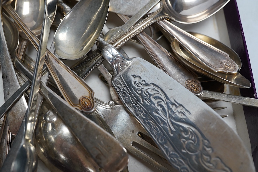 A group of odd silver flatware teaspoons, butter knives and lobster picks, 18th to 20th century, 527g. Condition - fair